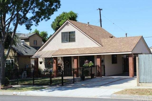 Front of house, gated with beautiful brick work