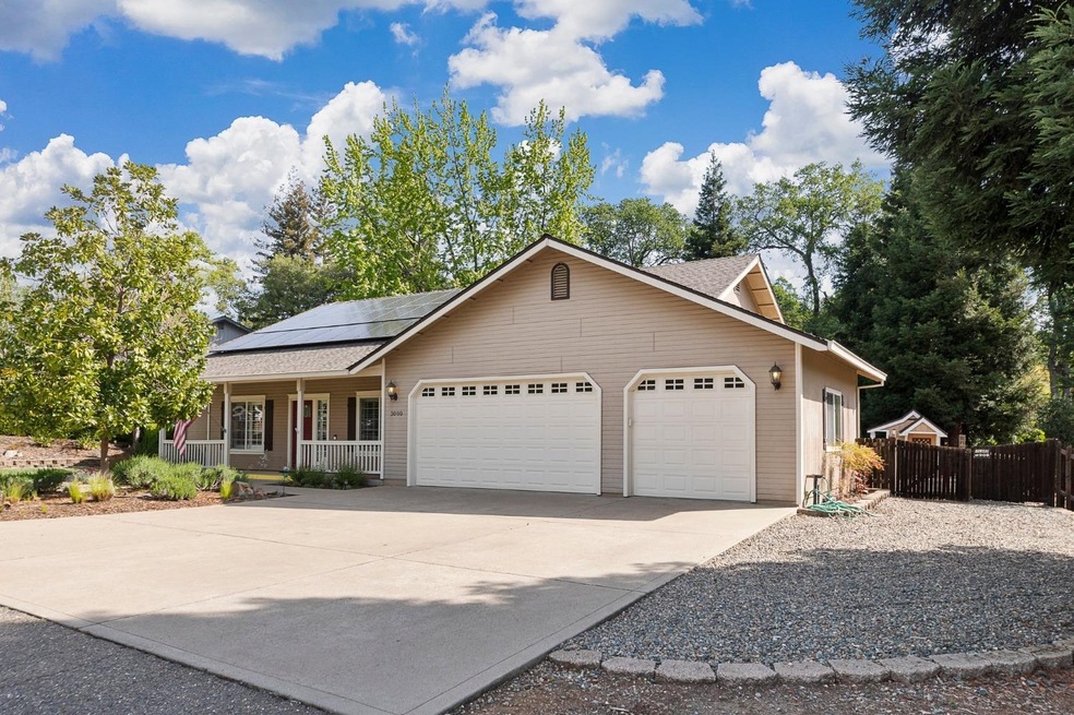 With gorgeous curb appeal, it's inviting from the moment you arrive with covered porch, Impeccable landscaping front & rear, 3-car garage, RV parking/access, efficienct Solar, automatic sprinklers front & rear, plantation shutters, and so much more!