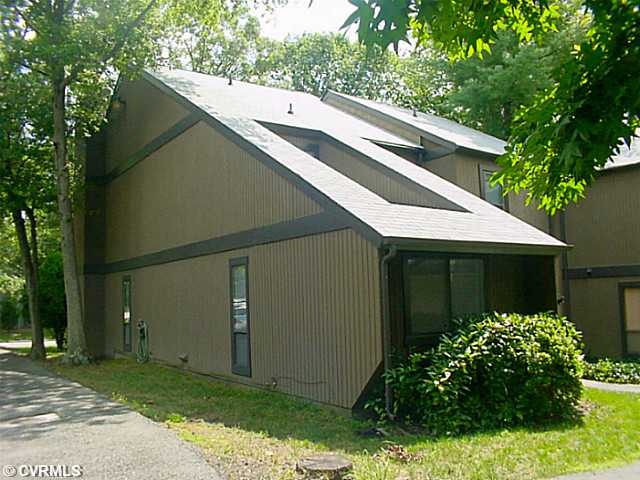 Exterior Front - Front view of end unit condominiu