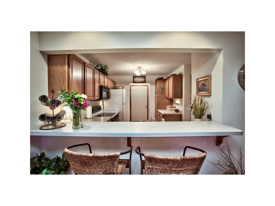 Kitchen. RAISED KITCHEN BAR WITH VIEW TO DINING NO