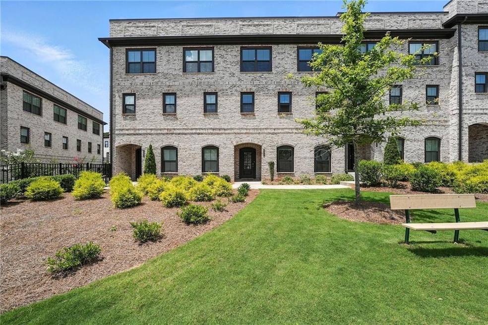 View of front of house with brick siding