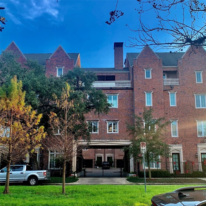 Lovett Boulevard entrance with gated drive.