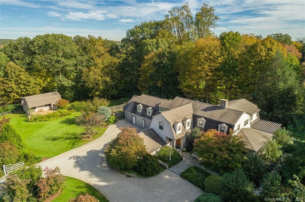 This stylish country home is sited on a beautiful 