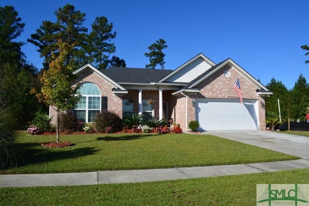 Front of home with beautiful landscaping