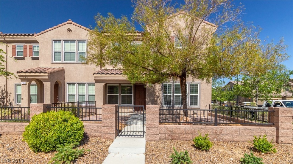 Gated corner Lot and front patio nestled in-betwee