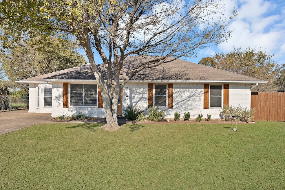 Modern white brick home with shutters