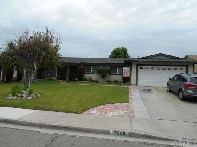 1 Story Home that is fully landscaped front and ba