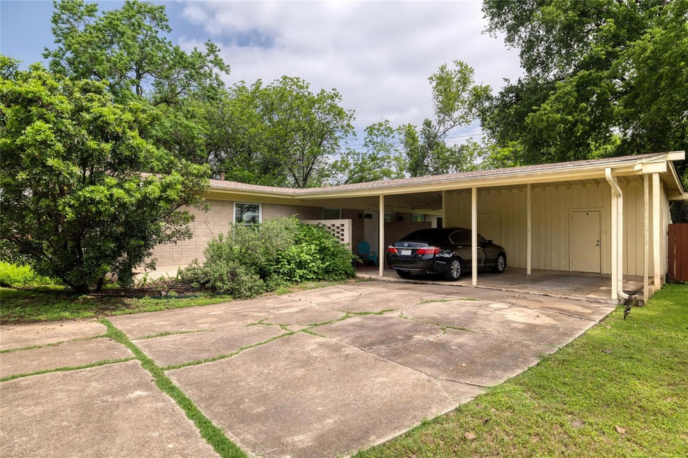 View of car parking with a carport and concrete d