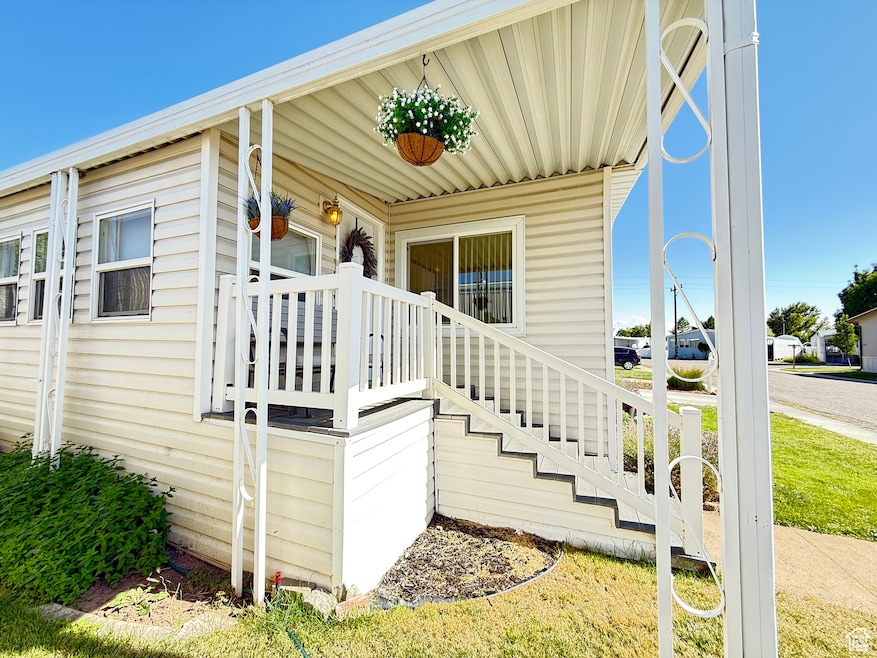 Entrance to property with covered porch.