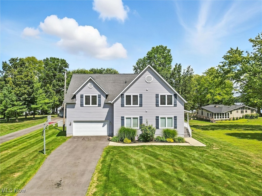 490 Peacock Ln, Roaming Shores, OH 44084 - photo 1