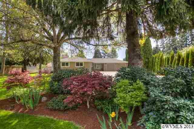 Beautiful level .51 acres, rural feel in the city