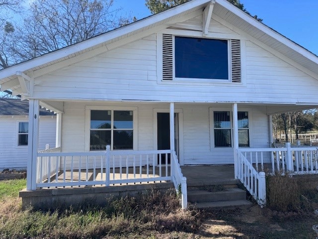 Bungalow featuring a porch