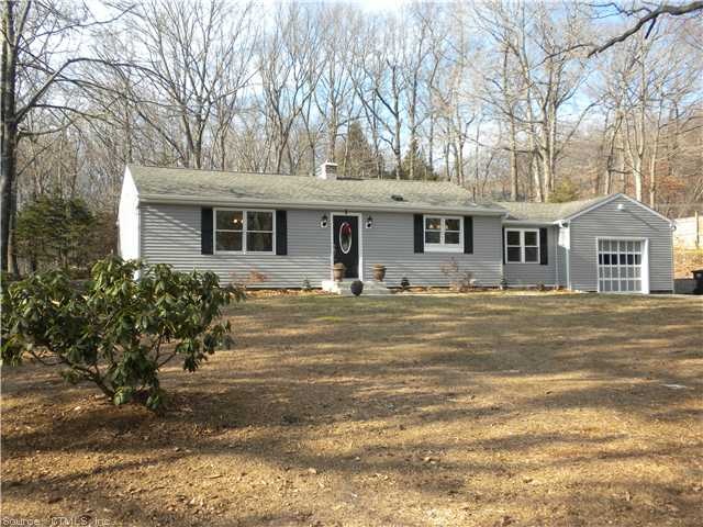 Exterior Front. New siding, roof and windows.