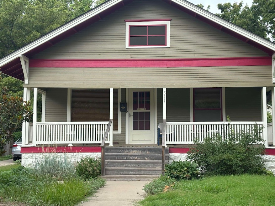 Front of house with covered front porch