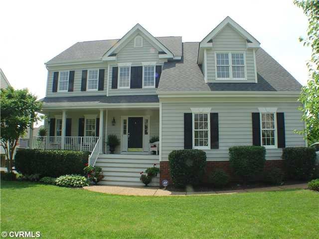 Exterior Front - Professionally landscaped lot