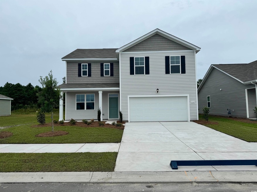 View of front property featuring a front yard and 