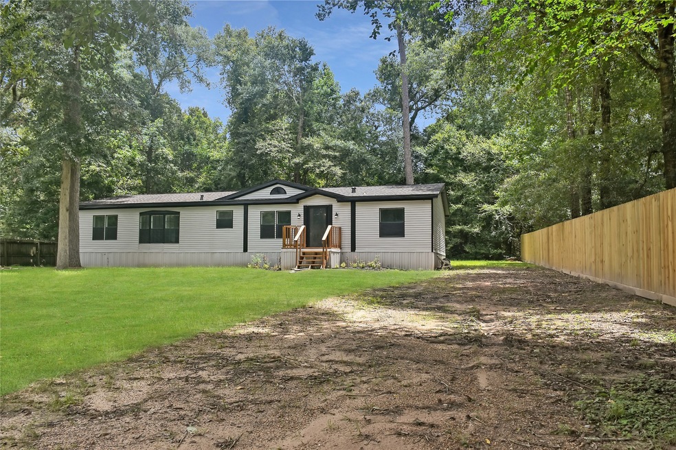 11081 Timber Rd, Cleveland, TX 77328 - photo 1