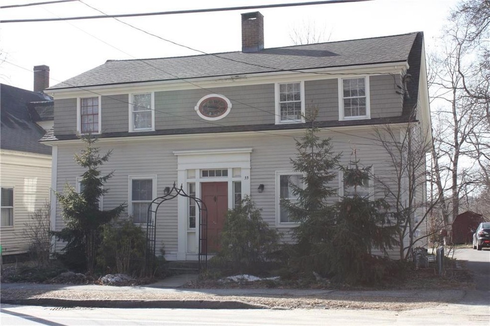 From the street. Front door leads to...