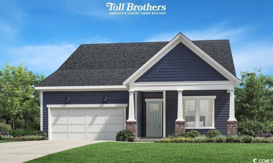 Craftsman-style home featuring a front yard, concr