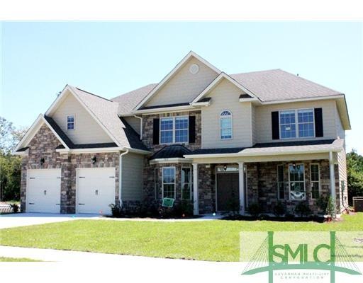Exterior Front. Picture of Same Home Completed on 