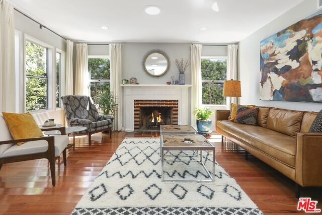 Cozy fireplace courtesy of Emily Johnson, The Loved House