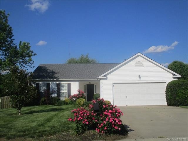 Great ranch plan with fenced backyard on mostly le