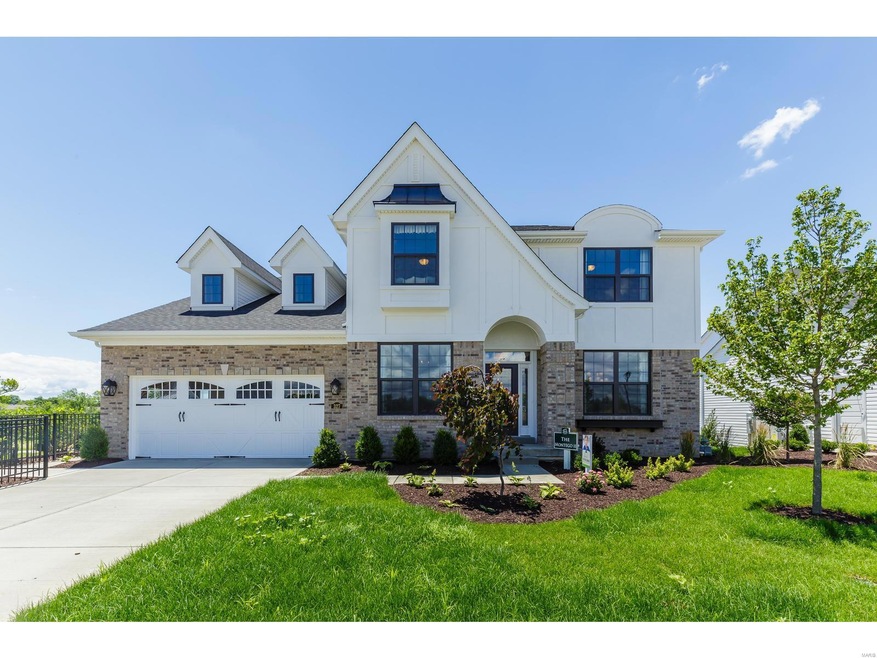 Stunning Front Elevation with 3 Car Tandem Garage