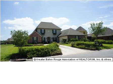 front view with lush landscaping