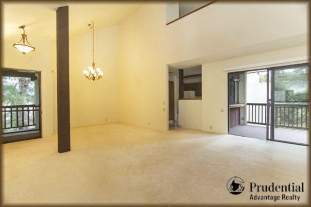 Spacious living room/dining area looking out towar