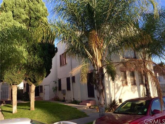 front view of the building w shared yard space on 