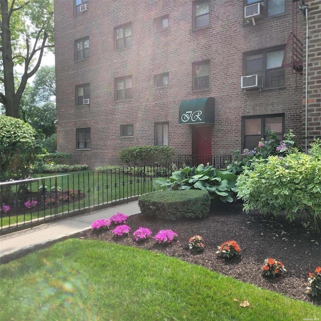 86-70 Francis Lewis Blvd unit A-13, Hollis, NY 11423 - photo 1