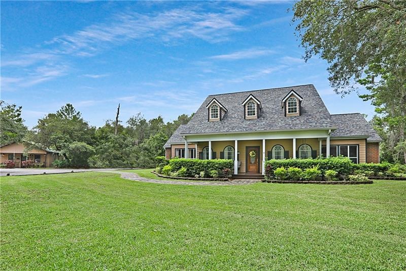 Beautiful exterior on a 5+ acre lot