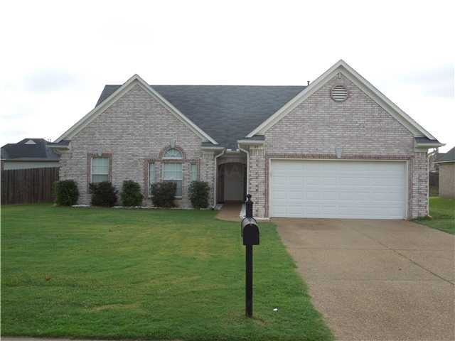 Like new 4 BR 3 Bath brick home features wonderful