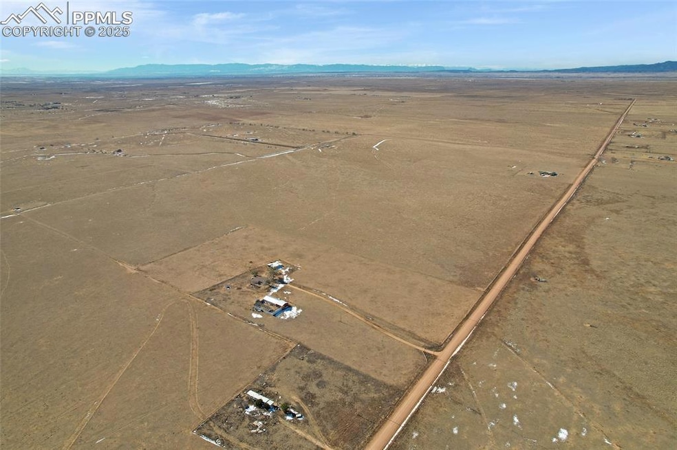 Aerial view with a mountain view and a rural view