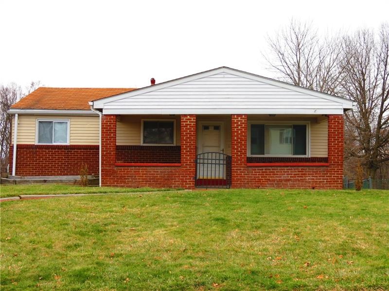Welcome to this lovely ranch home!  The huge cover
