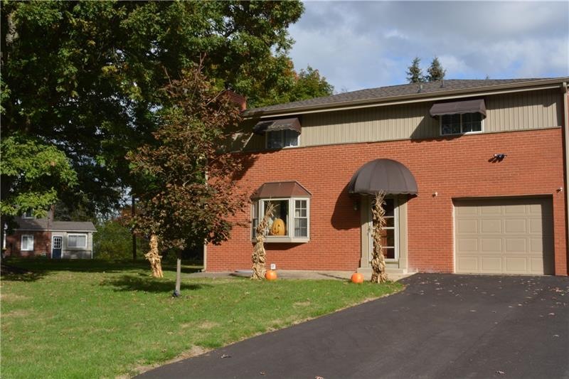 2 Story brick home situated on .60 acres of a leve