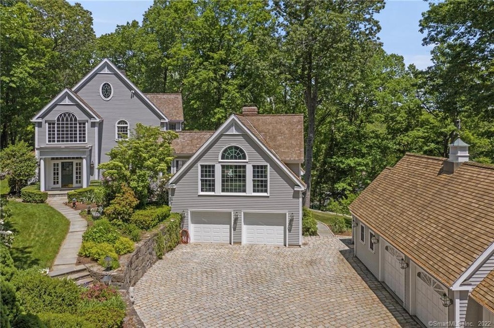 Front with 5 car garage.