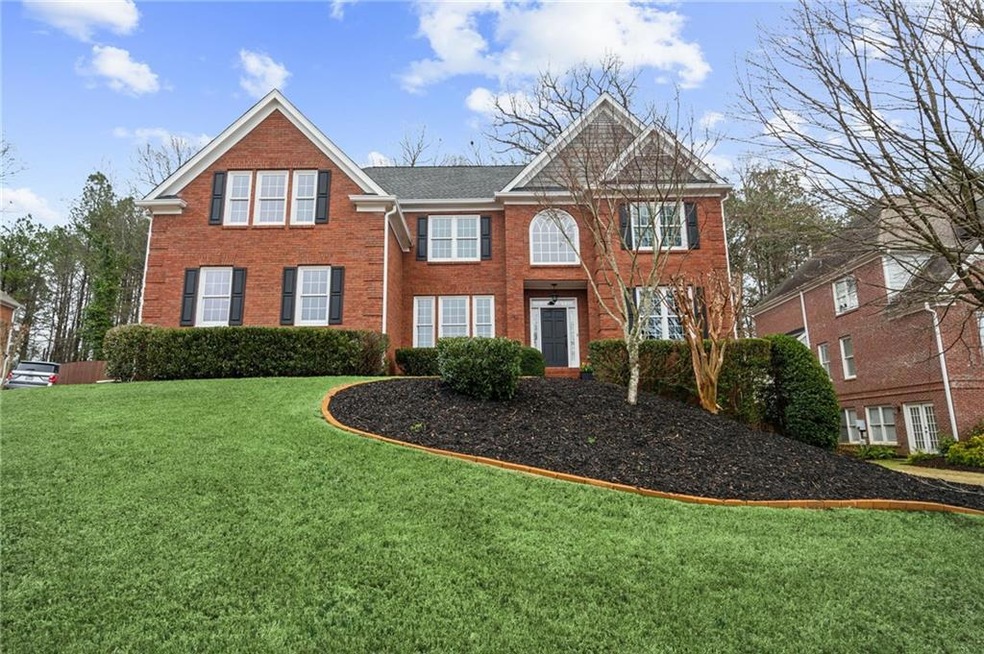 View of front of property with a front lawn