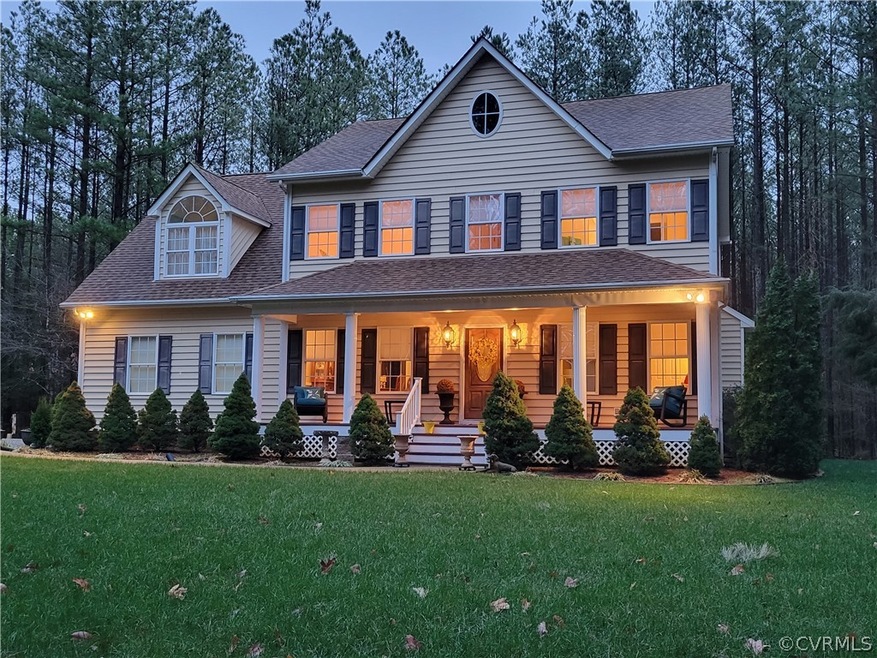 Lovely home with a lush, evel lawn maintained by V