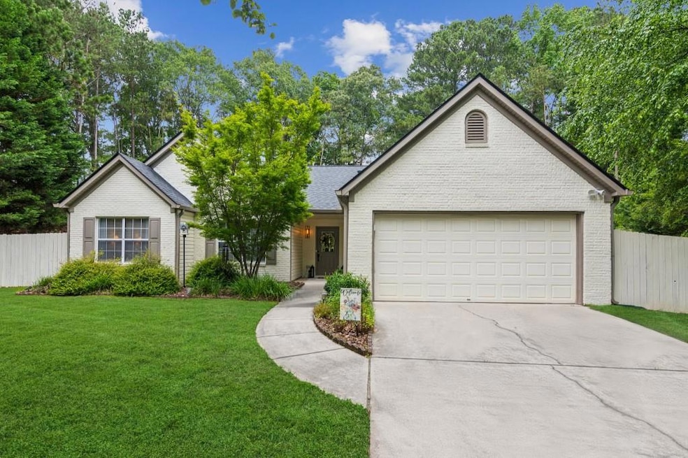 Welcome Home!Newer roof, fresh exterior paint, charming curb appeal, and nestled quietly at the back of the neighborhood & No HOA!