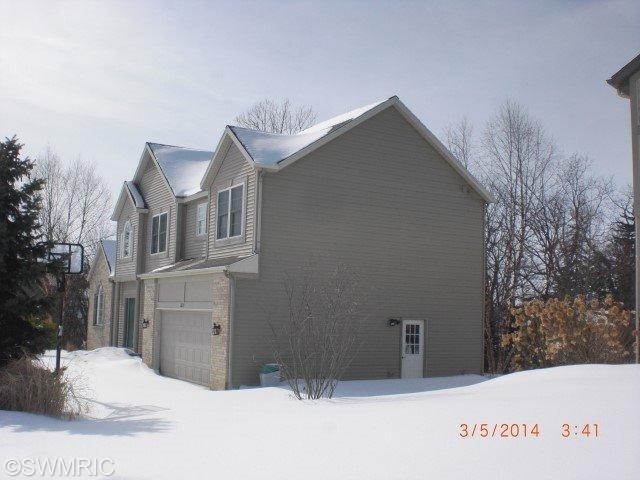 2237 Tradition Dr NE unit 52, Grand Rapids, MI 49505 - photo 1