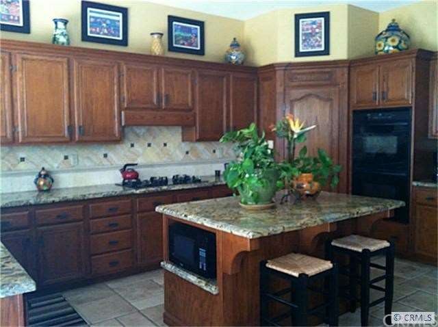 Kitchen with large island for preparing and eating