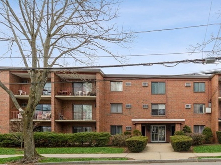 53 Paul St unit 34, Newton Center, MA 02459 - photo 1