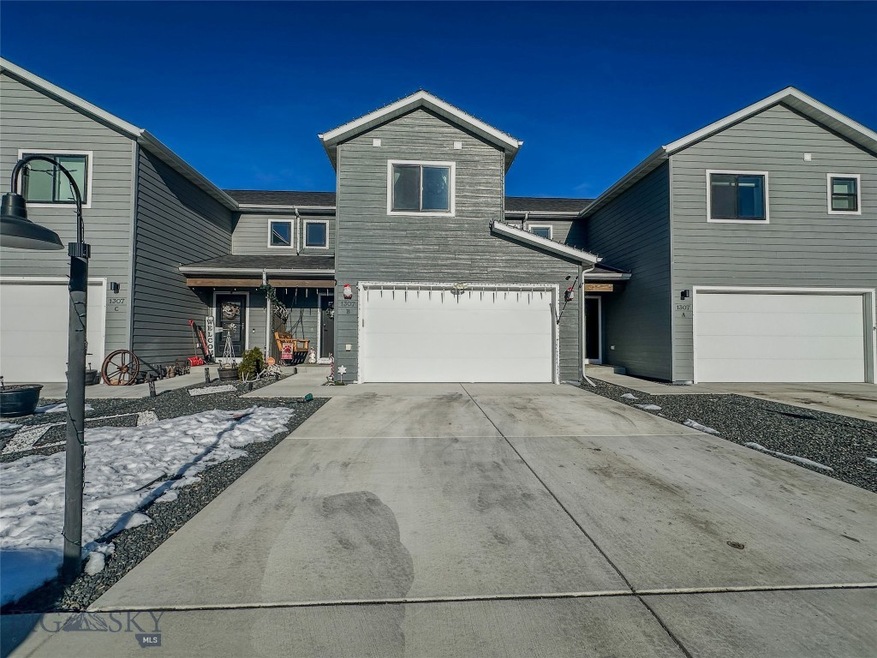View of front property with a garage