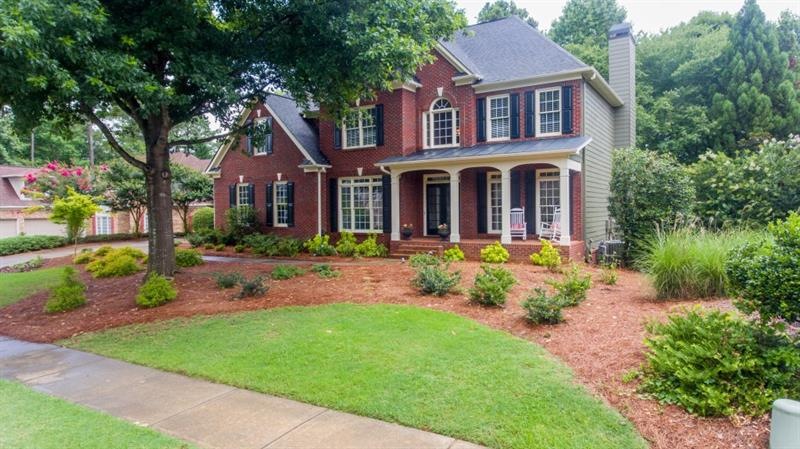 Front Of Home With Rocking Chair Front Porch