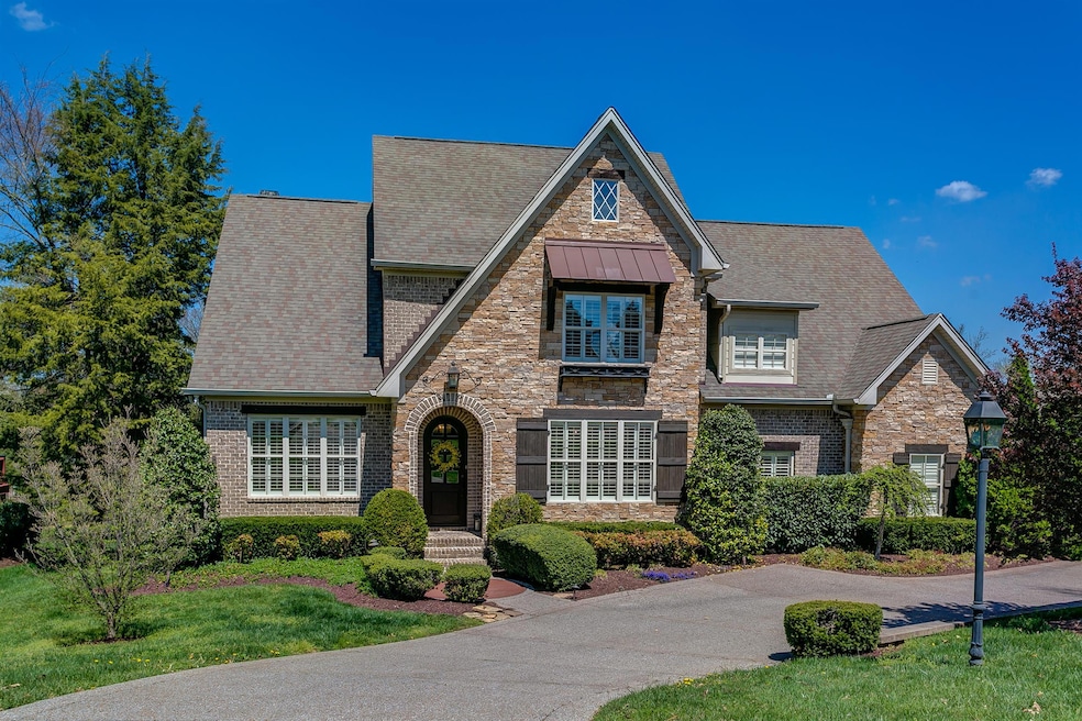 Welcome Home! All brick with stone accents offer the ultimate curb appeal