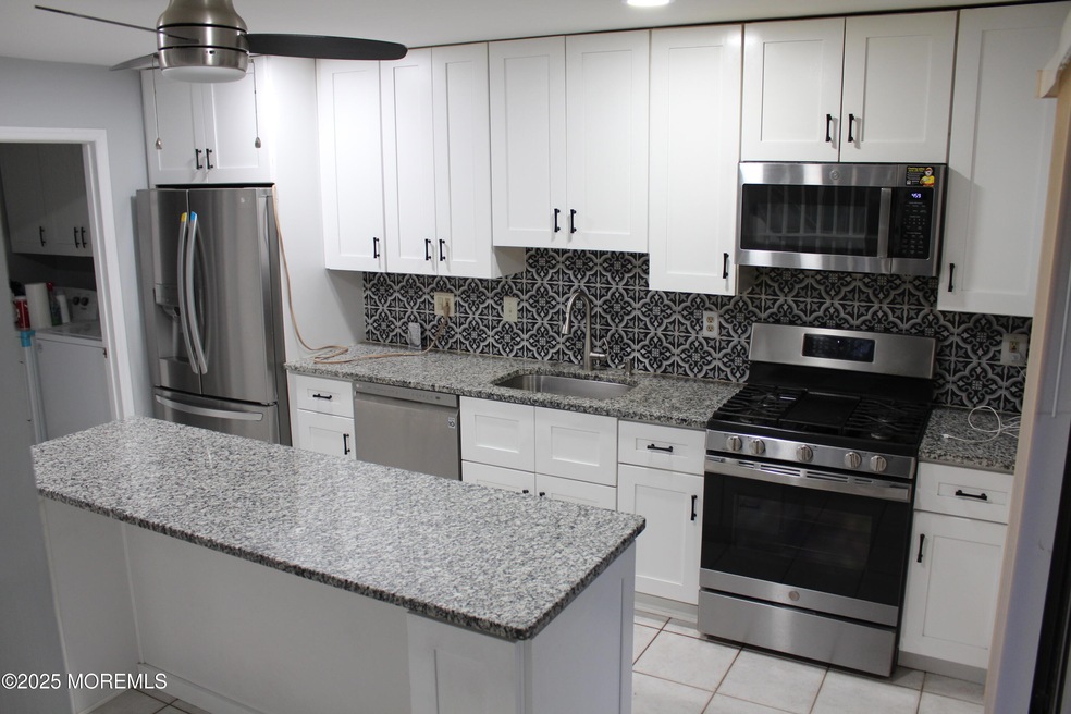 12 Rosebay Ct, Monmouth Junction, NJ 08852 - photo 1