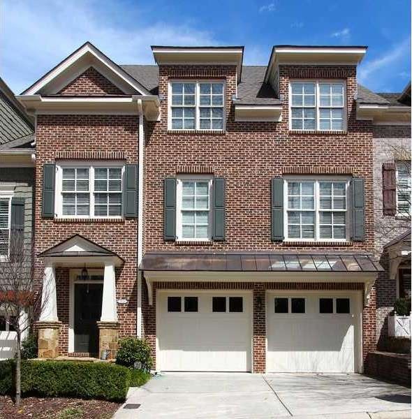 Exterior Front. Executive 3 Story Townhome with To