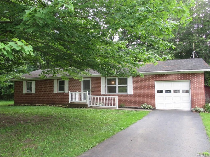 Brick Ranch on almost ONE Acre!
