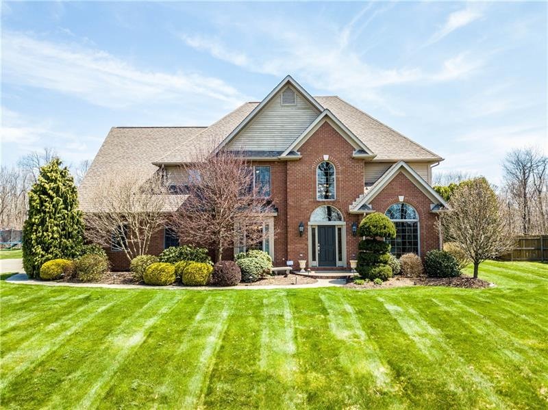 EXTERIOR FRONT VIEW OF THIS TWO STORY BRICK PROVIN